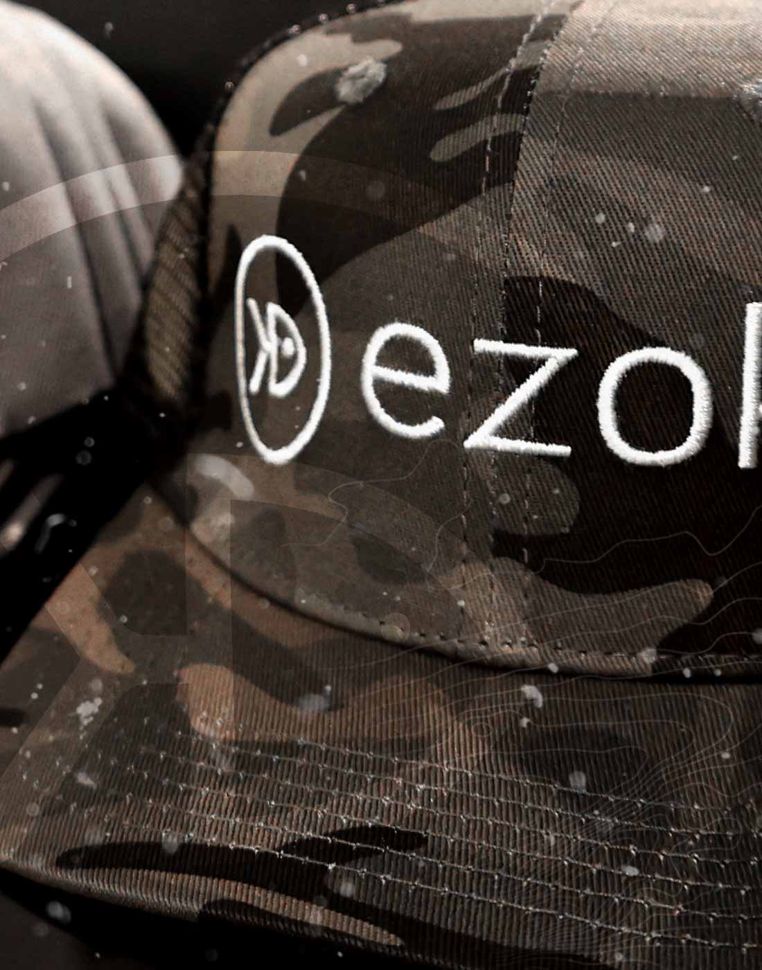 Face of trucker cap with white embroidery of EZOKO logo
