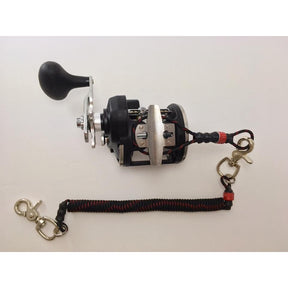 A brotherhood Trolling Rod holder attached to a musky trolling baitcast reel